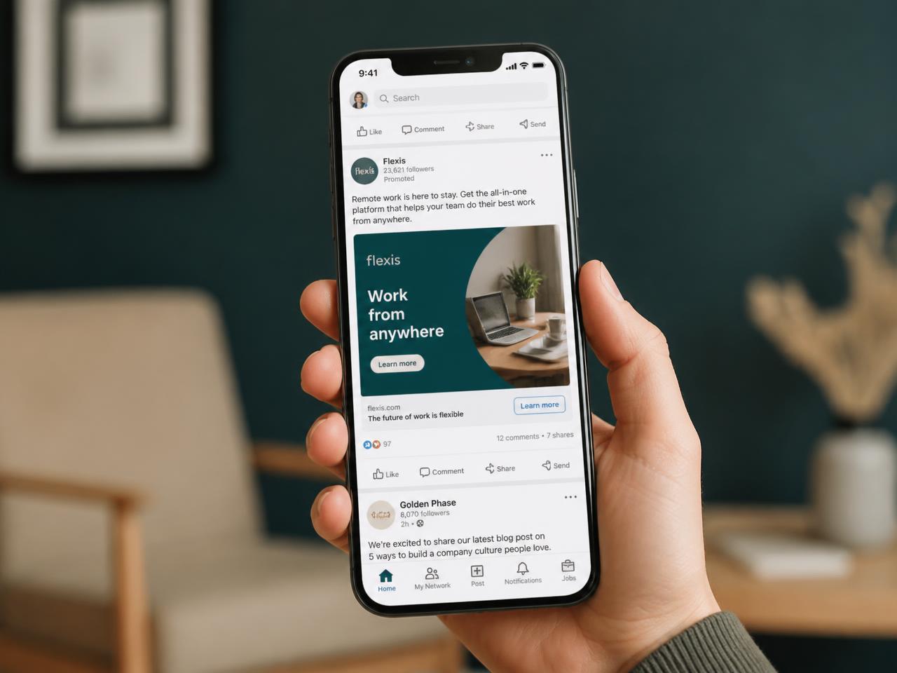 Smartphone showing a social media feed with a paid advertisement placement